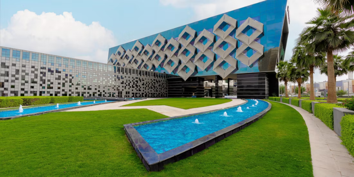 The Crowne Plaza Riyadh RDC exterior with its diamond-patterned facade and fountains